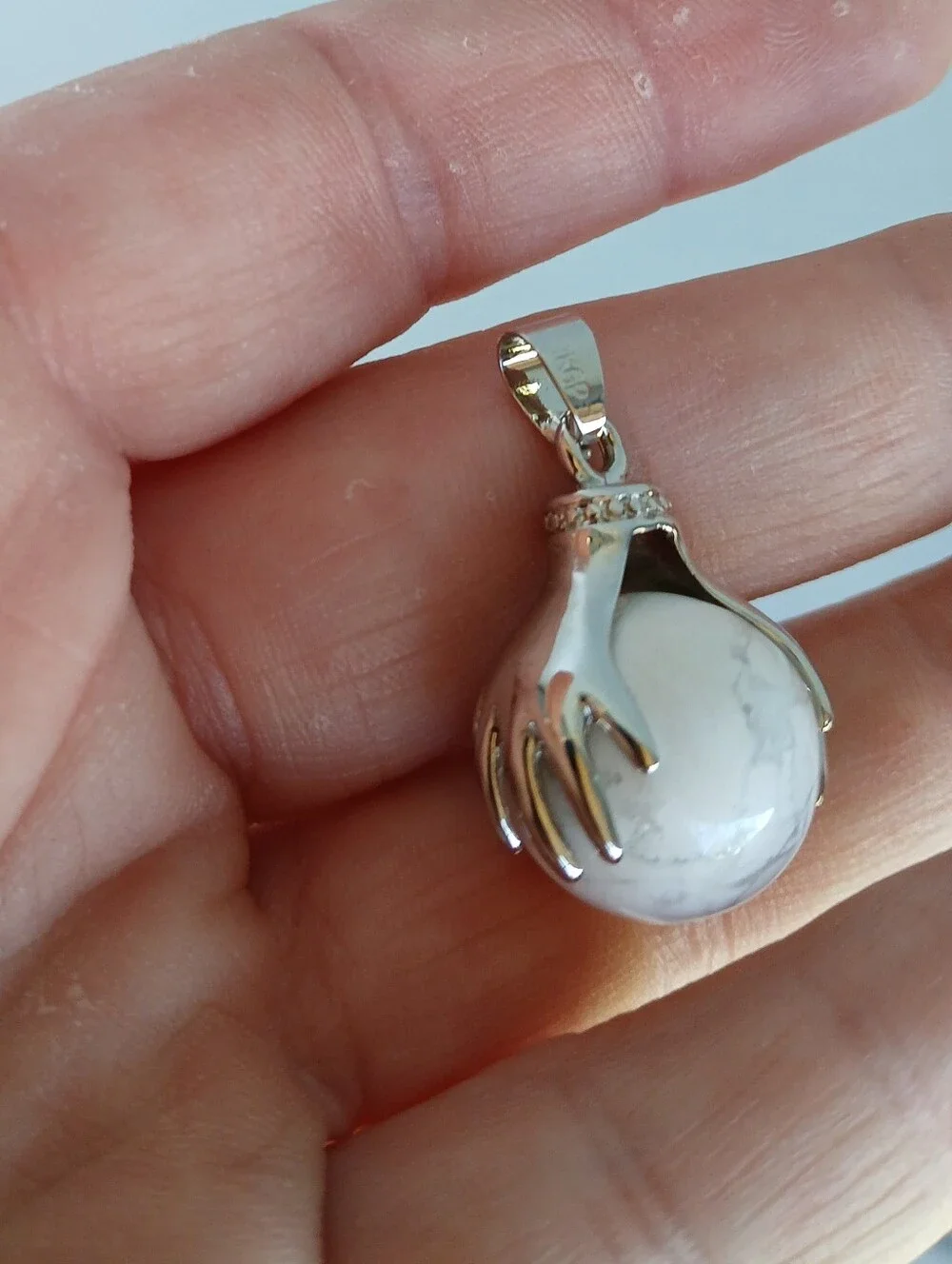 New 18K Hands Holding Howlite Sphere Pendant.